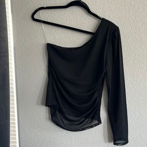 Black one shoulder mesh shirt.